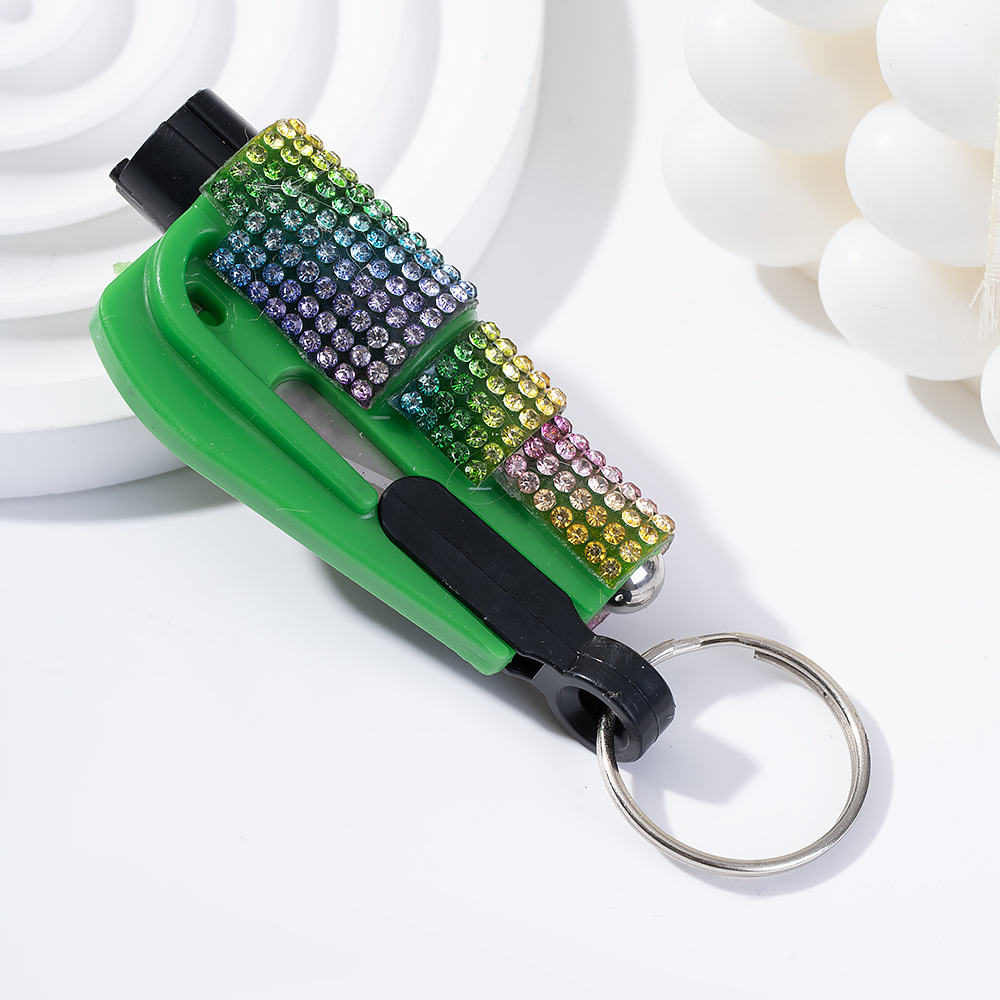 Wholesale bling seat belt cutter / window breaker keychain.