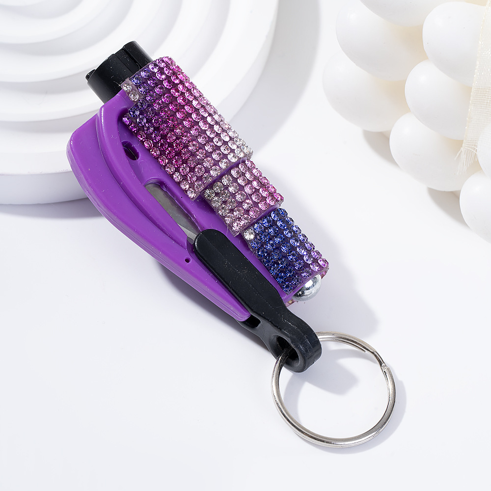 Wholesale bling seat belt cutter / window breaker keychain.
