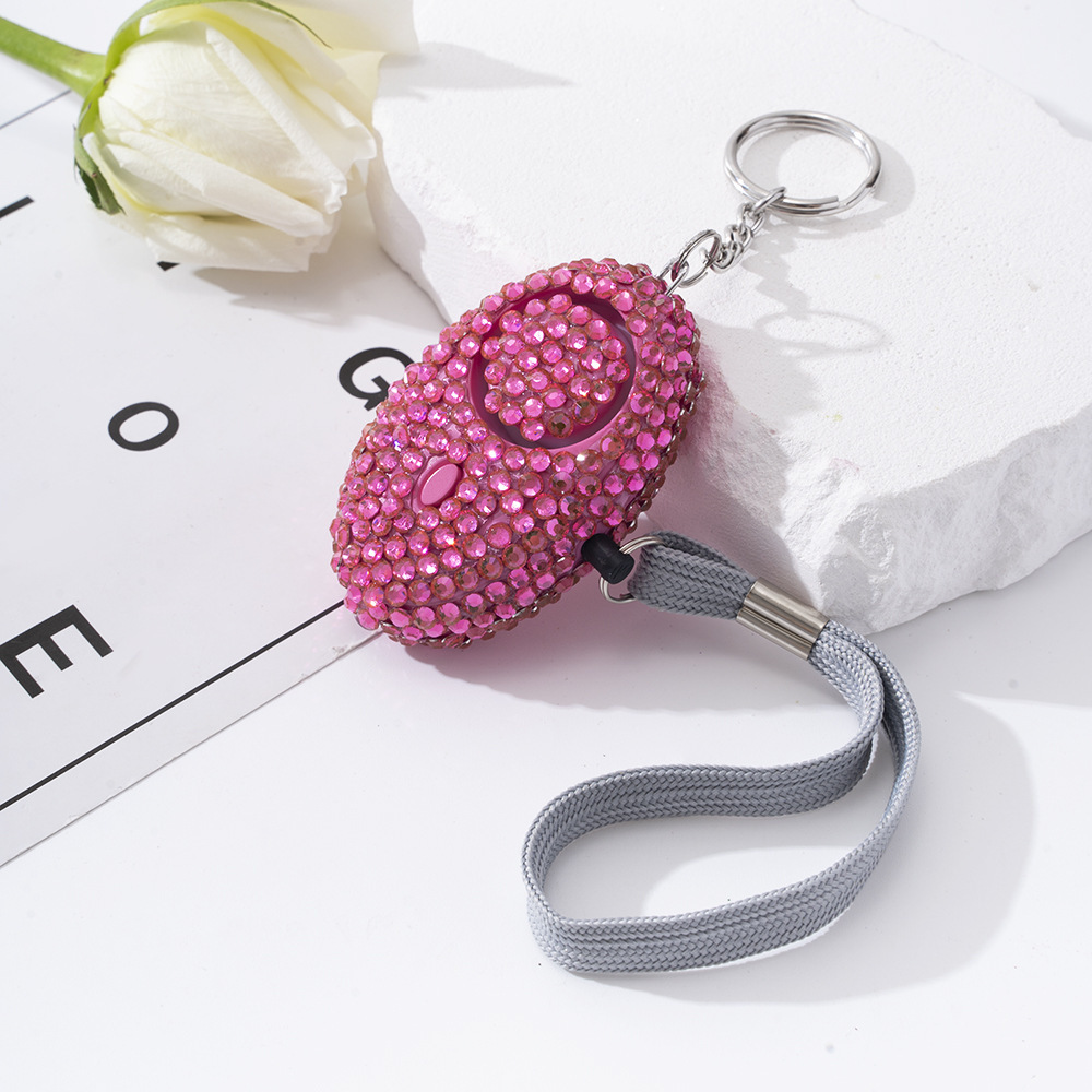 Wholesale 10 colors bling alarm keychain.