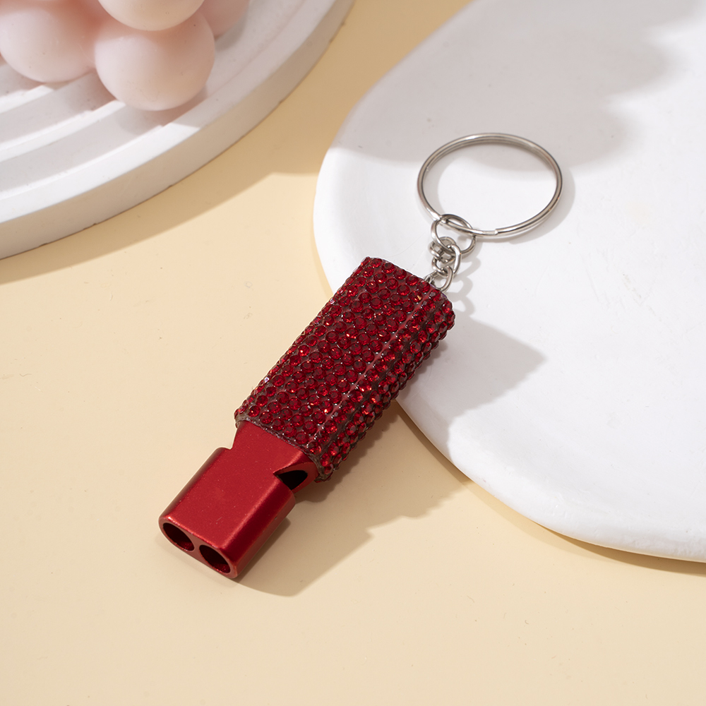 Wholesale bling aluminum alloy whistle keychain.