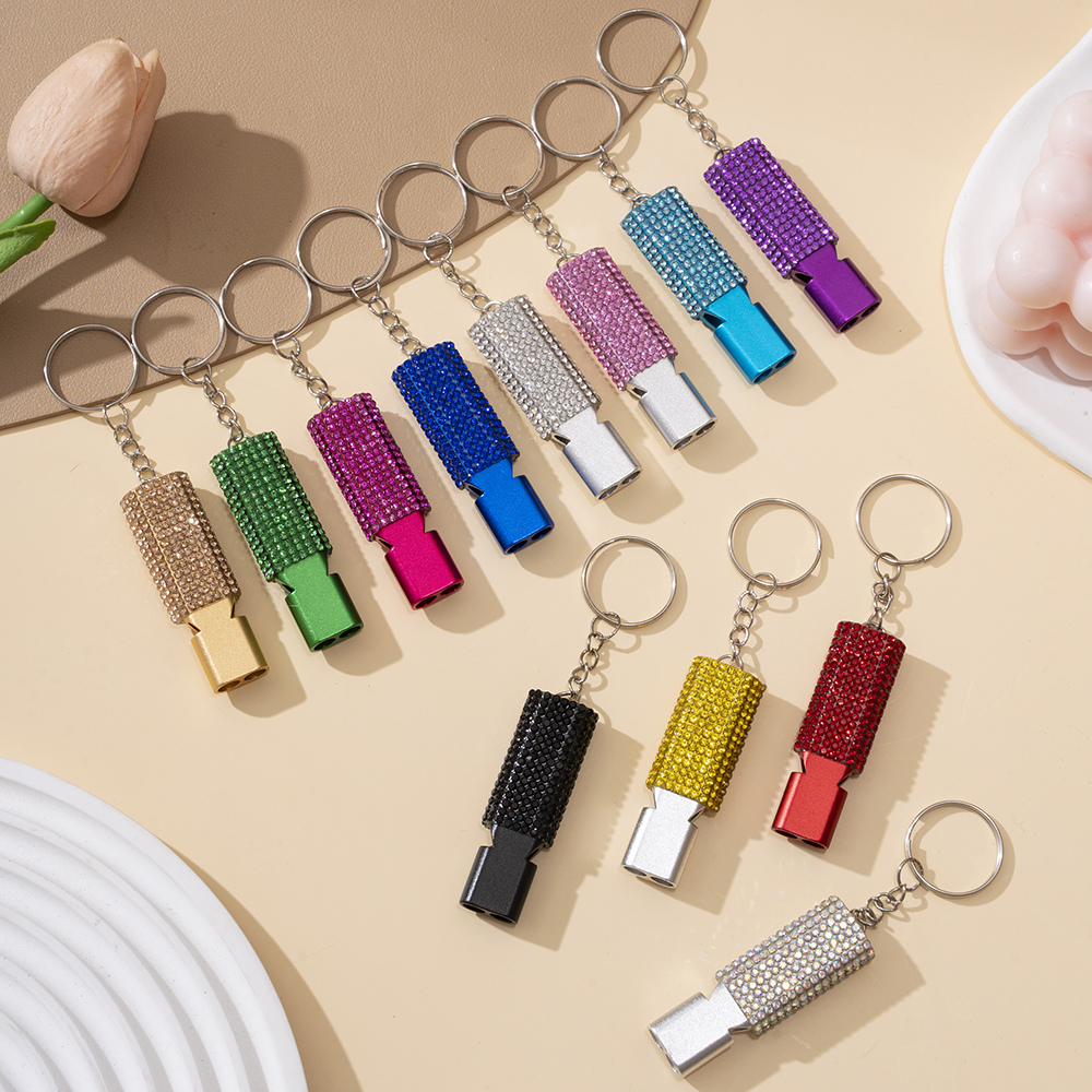 Wholesale bling aluminum alloy whistle keychain.
