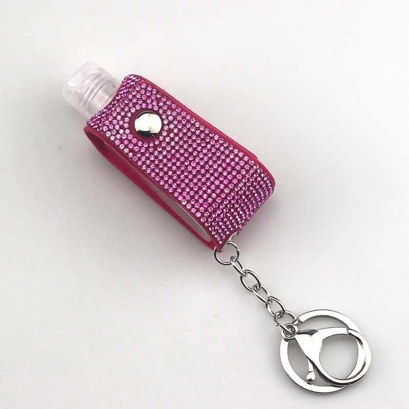 Wholesale bling hand sanitizer bottle keychain.