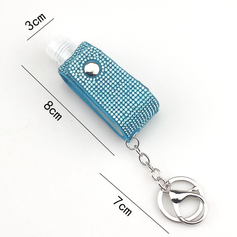 Wholesale bling hand sanitizer bottle keychain.