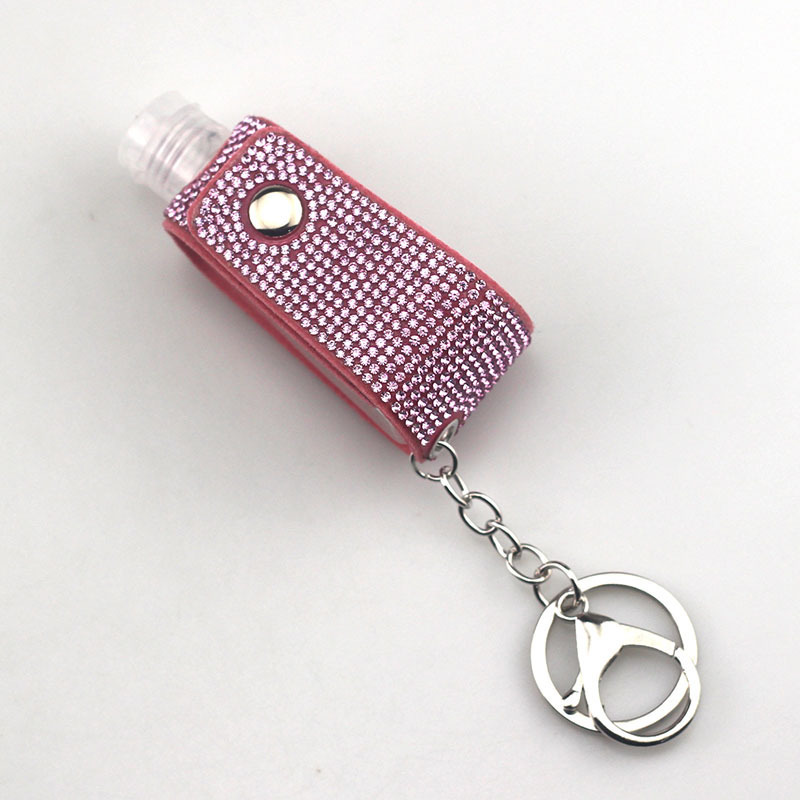 Wholesale bling hand sanitizer bottle keychain.