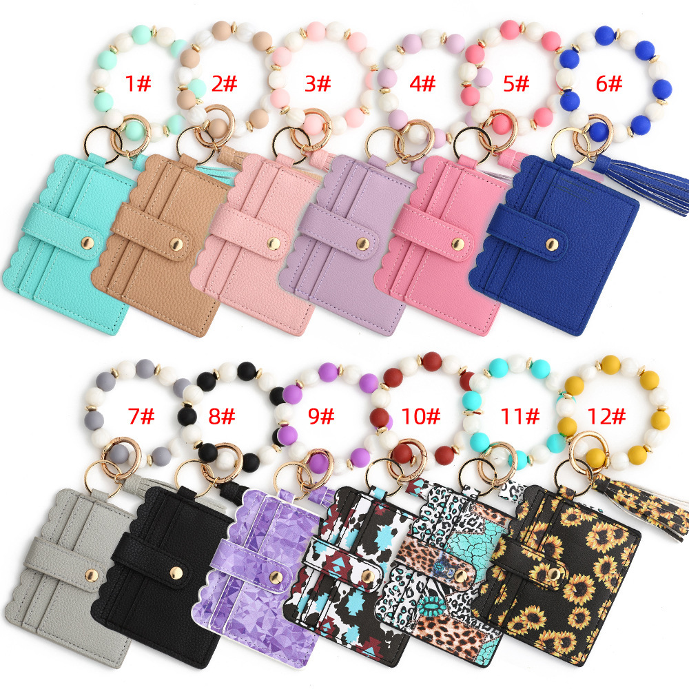 Wholesale Silicone Wristband PU Wallet Keychain.