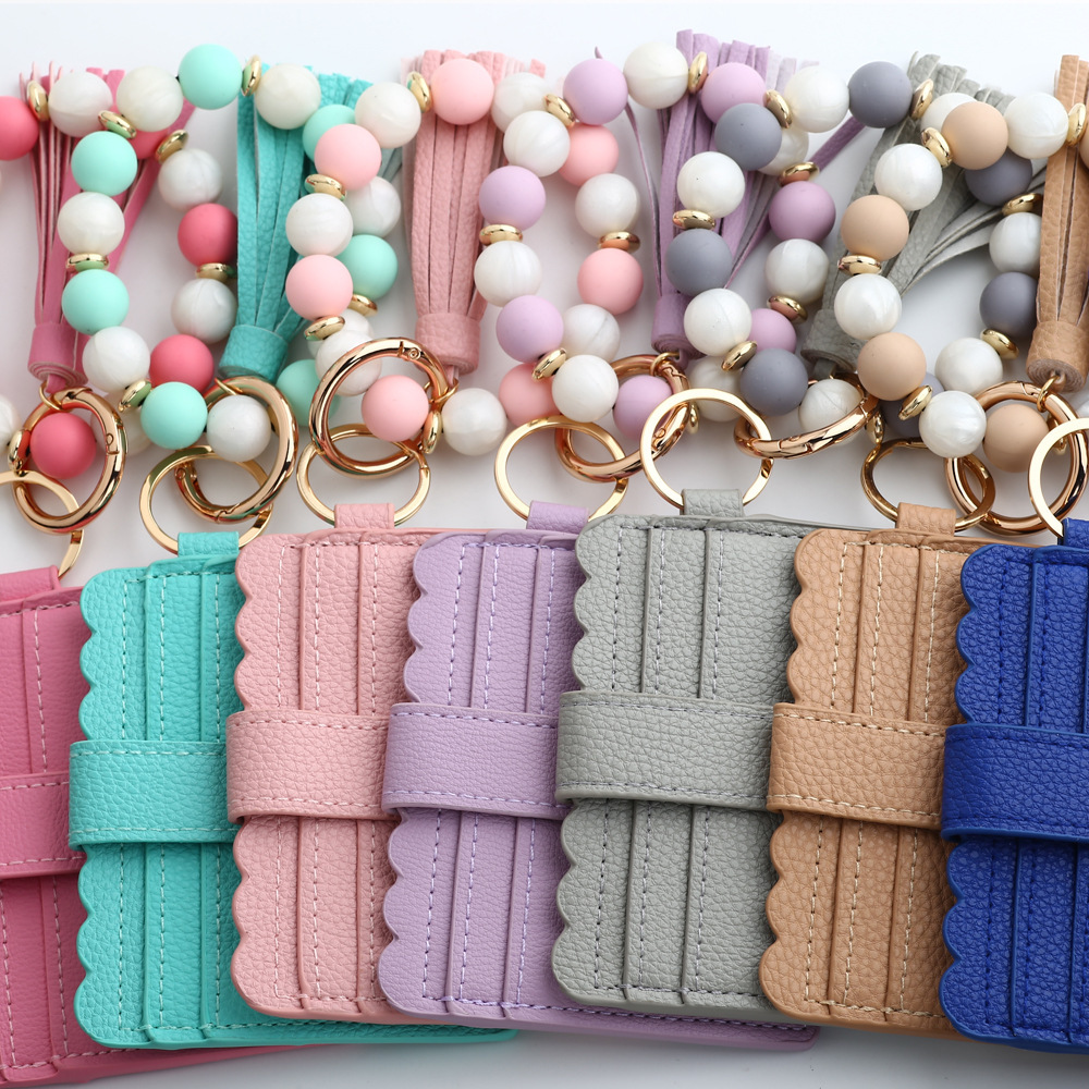 Wholesale Silicone Wristband PU Wallet Keychain.