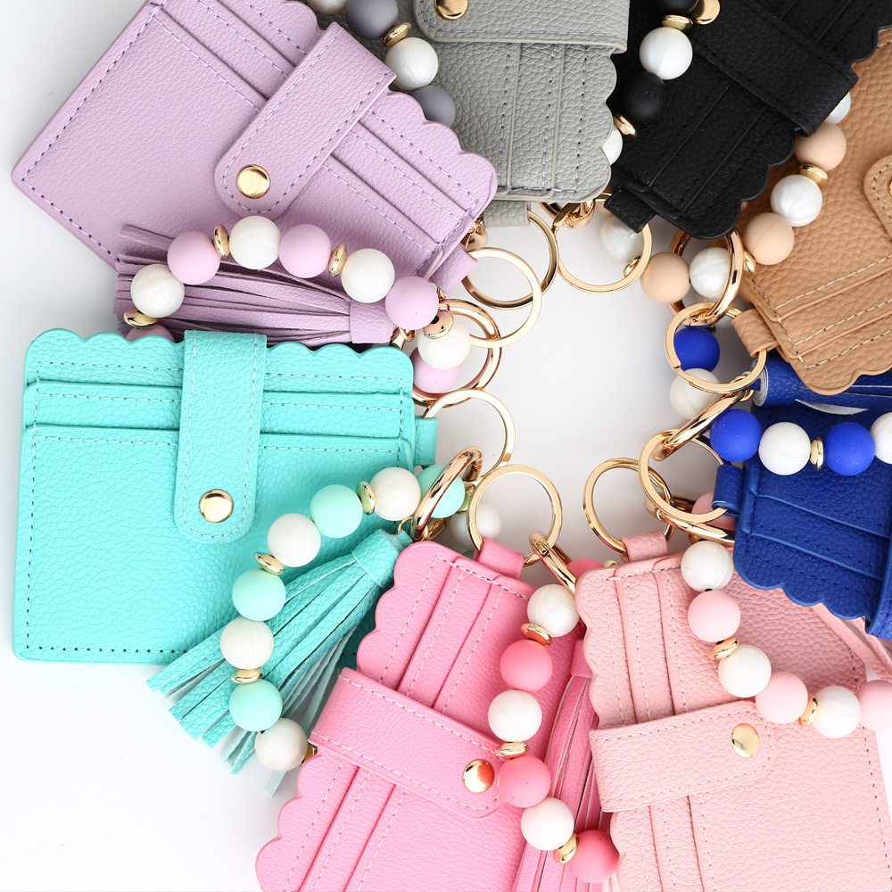 Wholesale Silicone Wristband PU Wallet Keychain.
