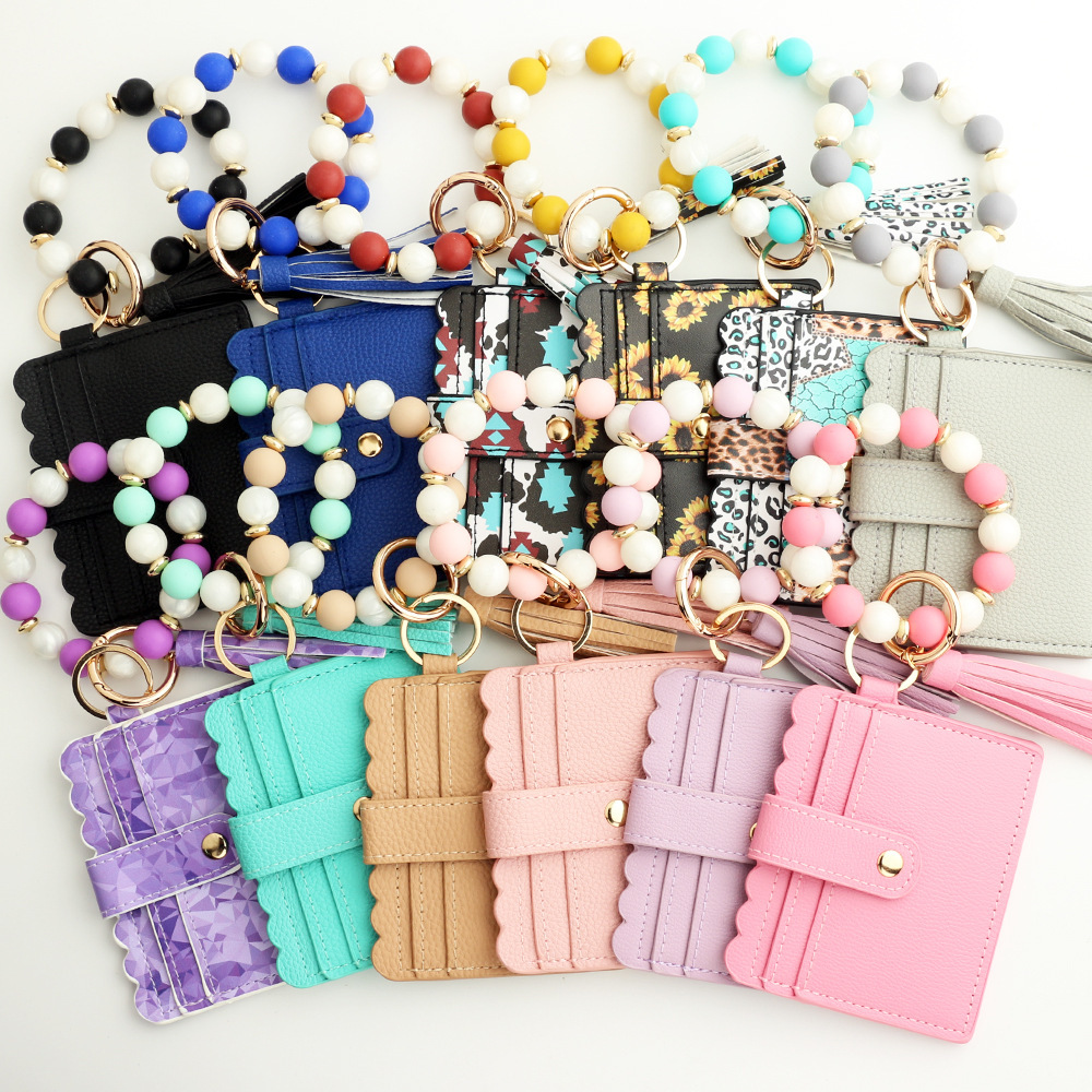 Wholesale Silicone Wristband PU Wallet Keychain.