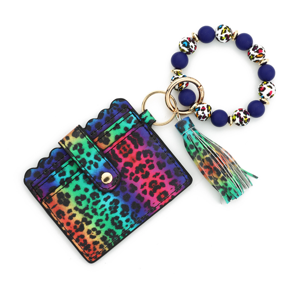 Wholesale colorful cow pattern card holder silicone wristband keychain.