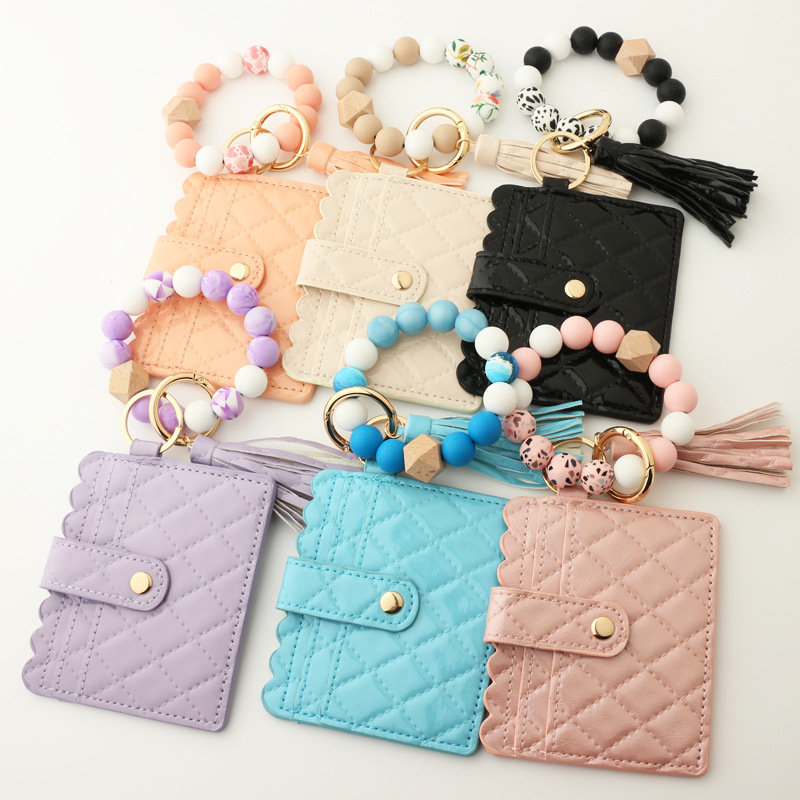 Wholesale leather wallet, silicone wrist strap keychain.
