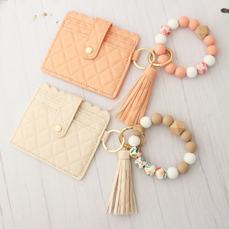 Wholesale leather wallet, silicone wrist strap keychain.