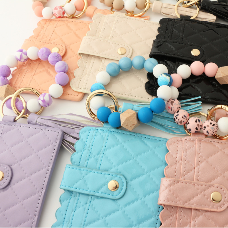 Wholesale leather wallet, silicone wrist strap keychain.