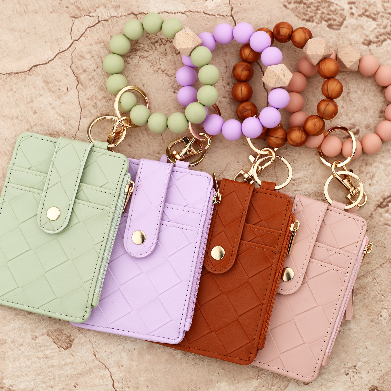 Wholesale woven texture wallet, silicone wristband keychain.