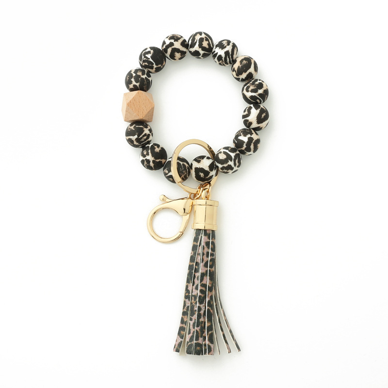 Wholesale color printed pattern silicone wristband keychain.
