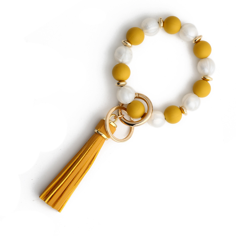 European and American cross-border new products 2024 silicone bead bracelet ladies wrist keychain tassel pendant anti-lost wooden bead bracelet