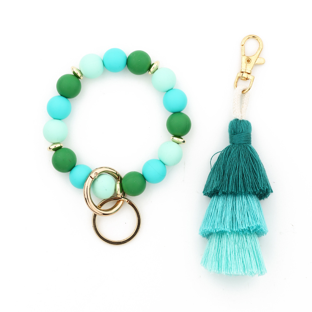 Cross-border jewelry 2024 Japanese and Korean fashion women's INS bracelet colorful three-layer line tassel silicone bracelet keychain