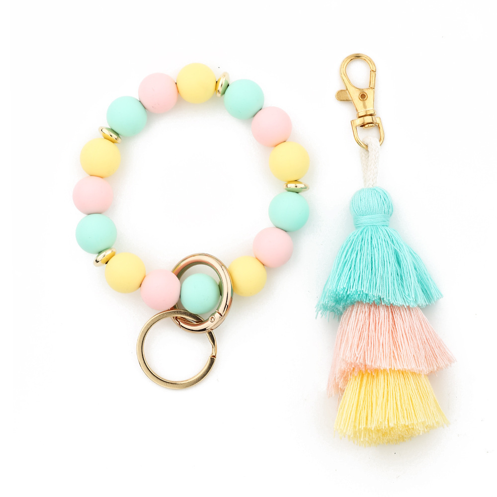 Cross-border jewelry 2024 Japanese and Korean fashion women's INS bracelet colorful three-layer line tassel silicone bracelet keychain