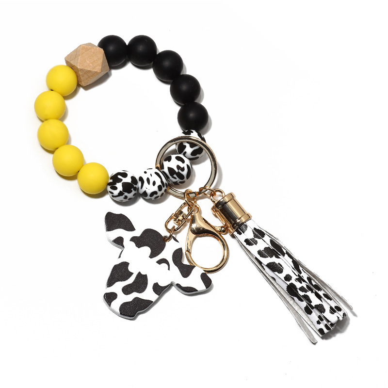 New autumn cross-border supply wood chip bull head pendant western style keychain men's silicone bead bracelet