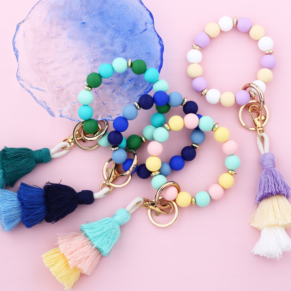 Cross-border jewelry 2024 Japanese and Korean fashion women's INS bracelet colorful three-layer line tassel silicone bracelet keychain
