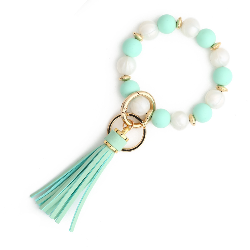 European and American cross-border new products 2024 silicone bead bracelet ladies wrist keychain tassel pendant anti-lost wooden bead bracelet