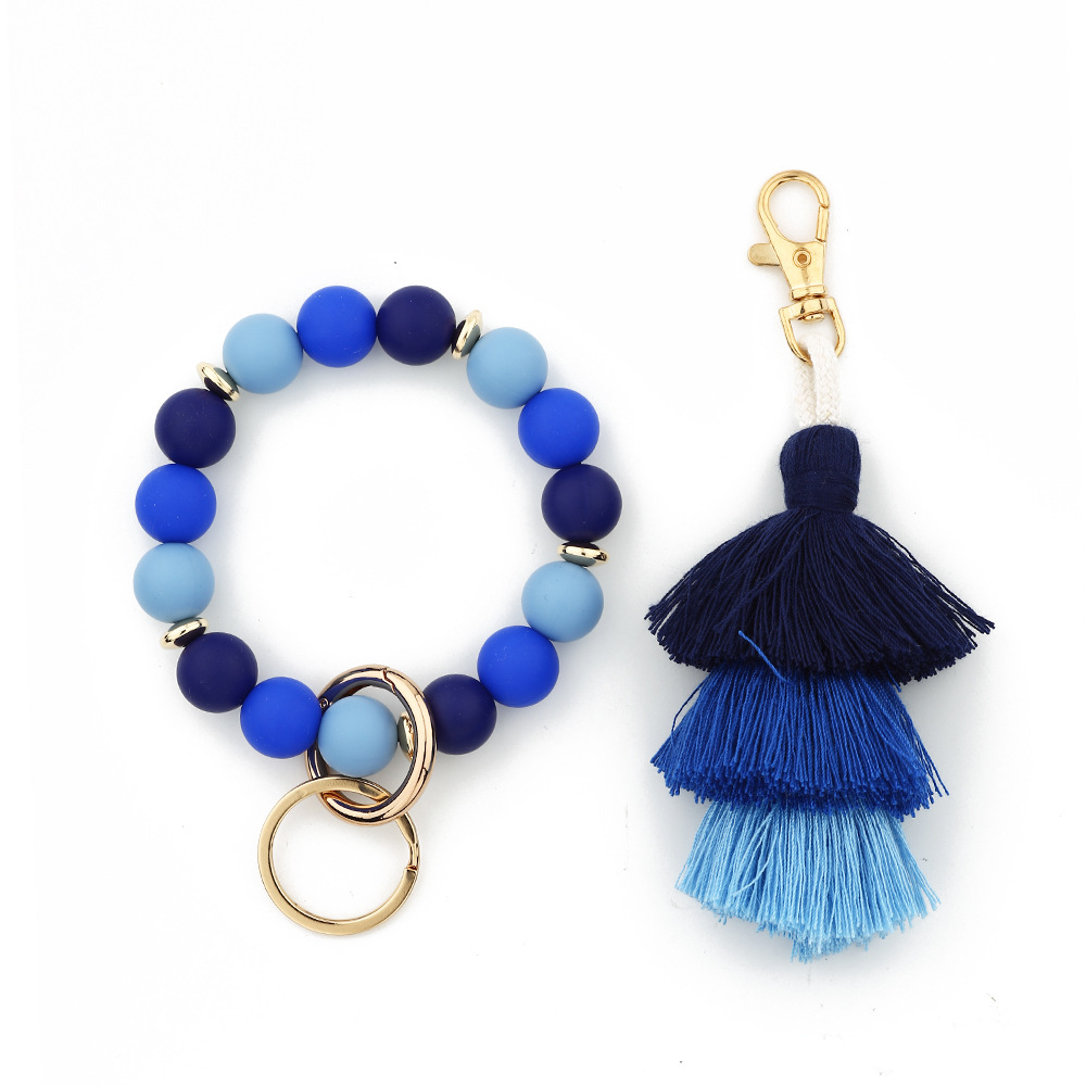Cross-border jewelry 2024 Japanese and Korean fashion women's INS bracelet colorful three-layer line tassel silicone bracelet keychain