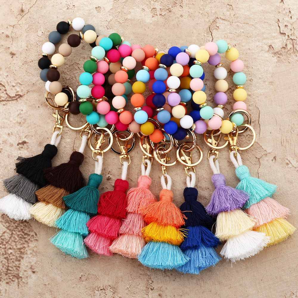 Cross-border jewelry 2024 Japanese and Korean fashion women's INS bracelet colorful three-layer line tassel silicone bracelet keychain