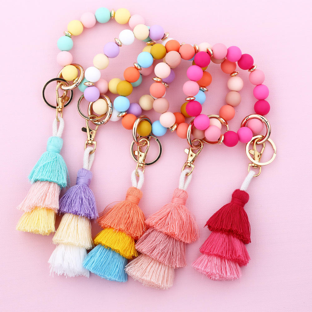 Cross-border jewelry 2024 Japanese and Korean fashion women's INS bracelet colorful three-layer line tassel silicone bracelet keychain