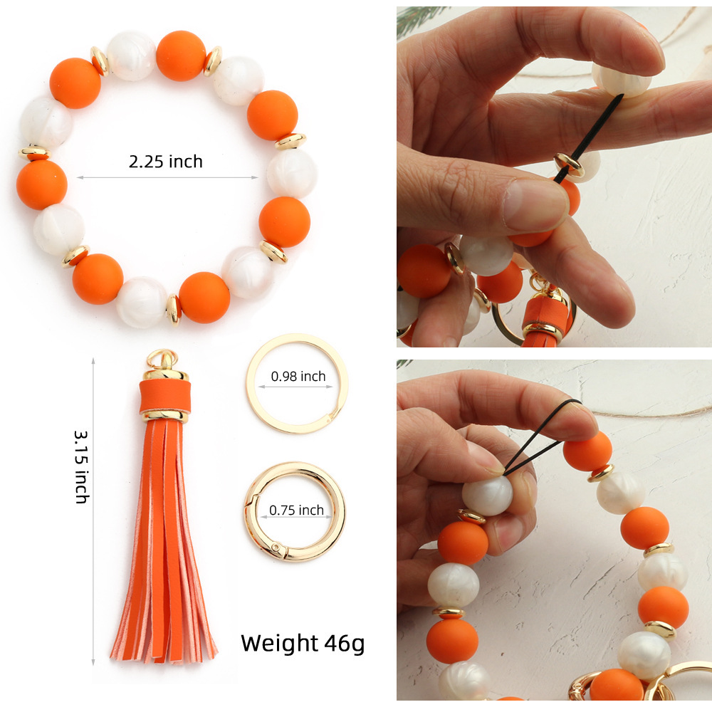 European and American cross-border new products 2024 silicone bead bracelet ladies wrist keychain tassel pendant anti-lost wooden bead bracelet