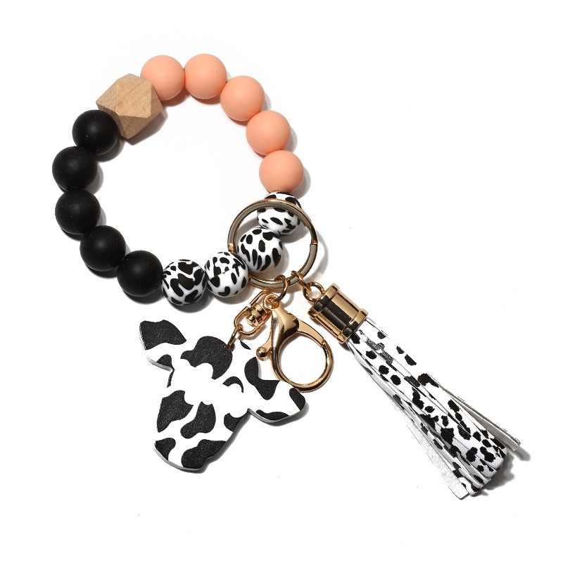 New autumn cross-border supply wood chip bull head pendant western style keychain men's silicone bead bracelet