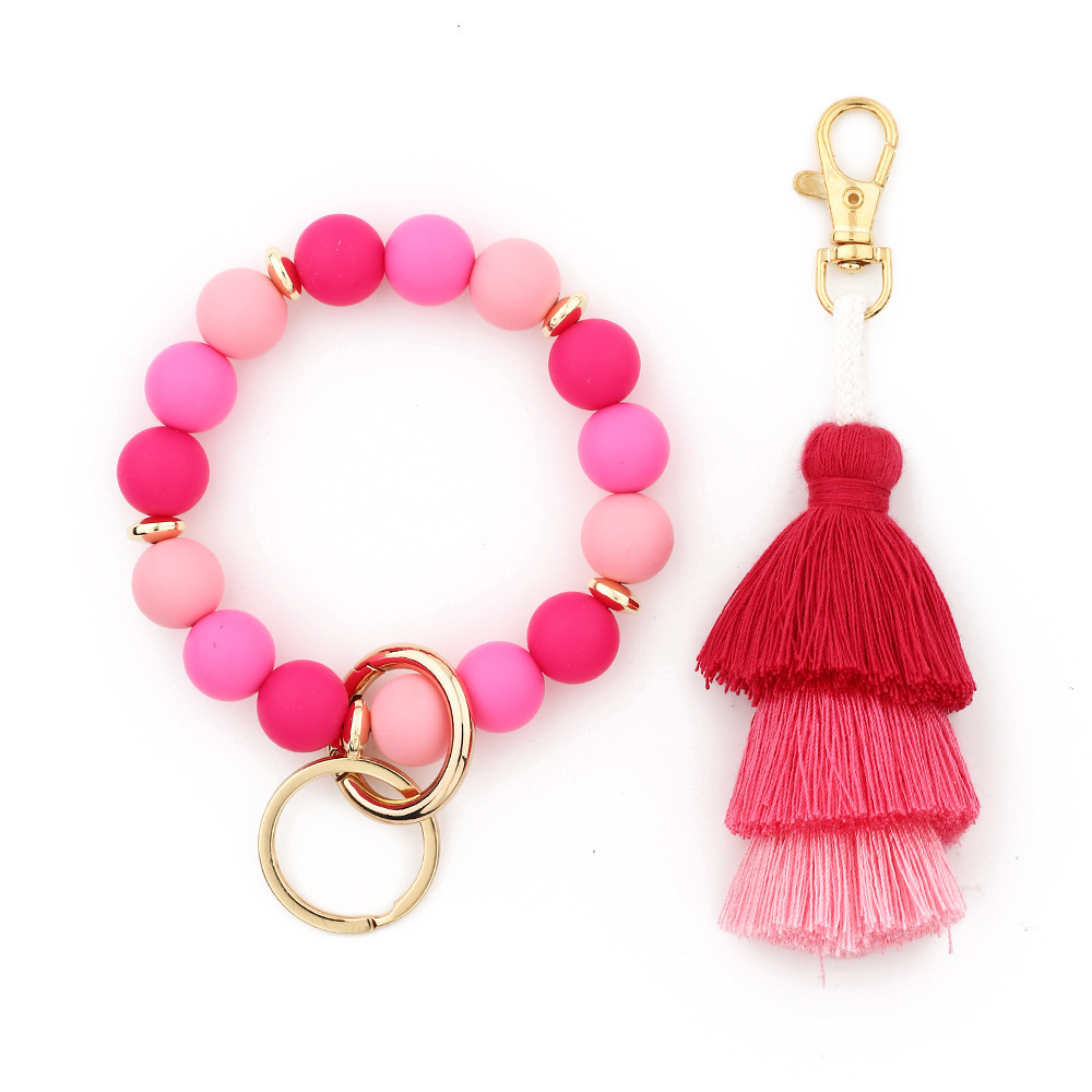 Cross-border jewelry 2024 Japanese and Korean fashion women's INS bracelet colorful three-layer line tassel silicone bracelet keychain