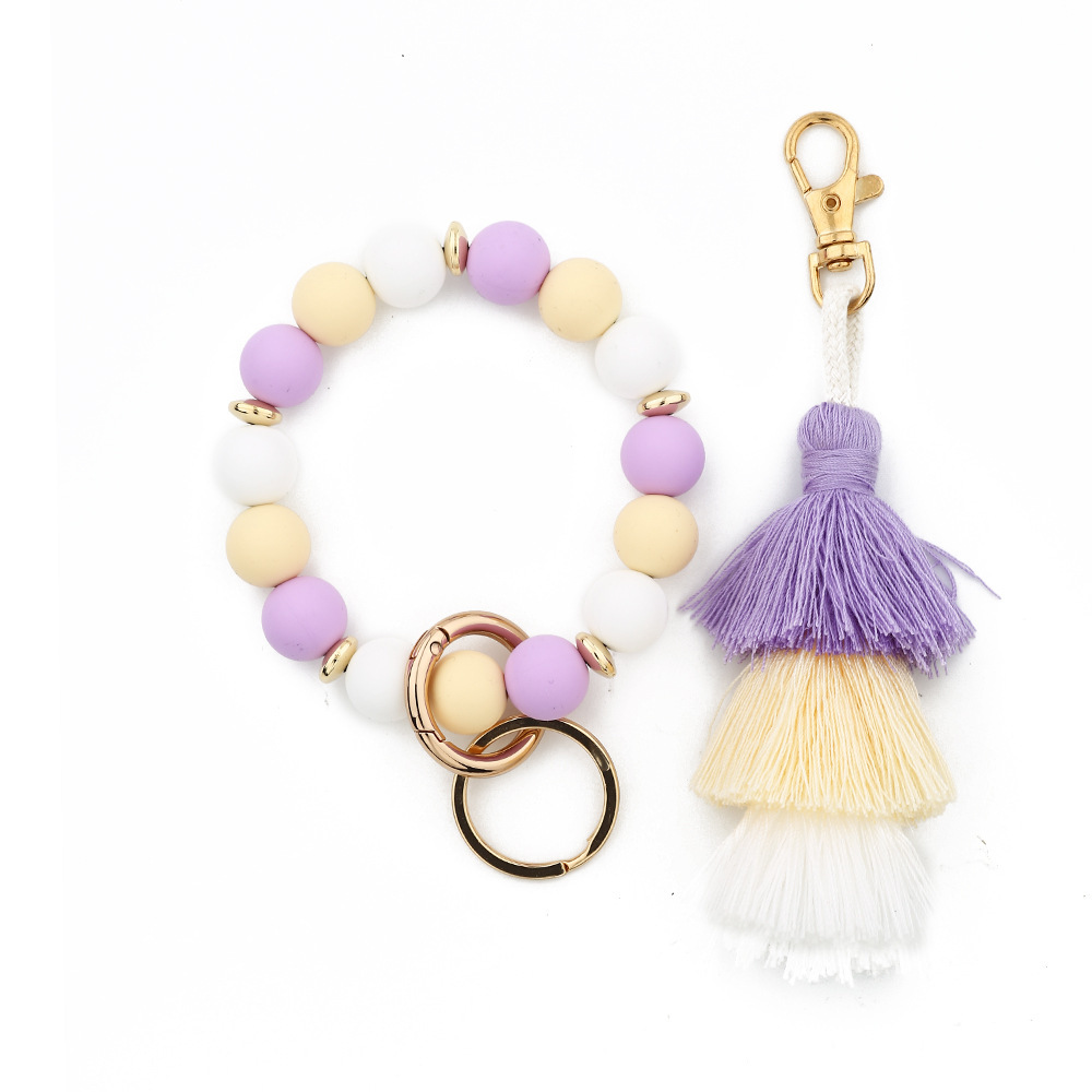 Cross-border jewelry 2024 Japanese and Korean fashion women's INS bracelet colorful three-layer line tassel silicone bracelet keychain