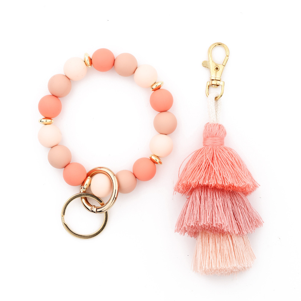 Cross-border jewelry 2024 Japanese and Korean fashion women's INS bracelet colorful three-layer line tassel silicone bracelet keychain