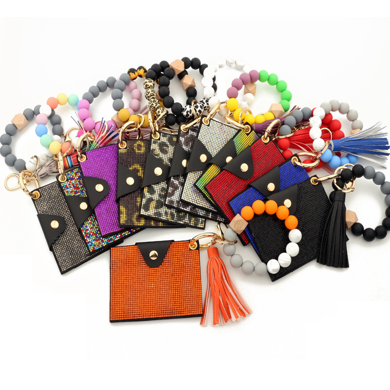 Wholesale bling wallet, silicone wristband keychain.