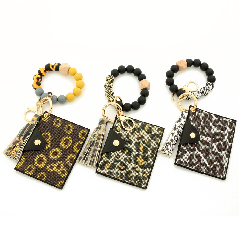 Wholesale bling wallet, silicone wristband keychain.
