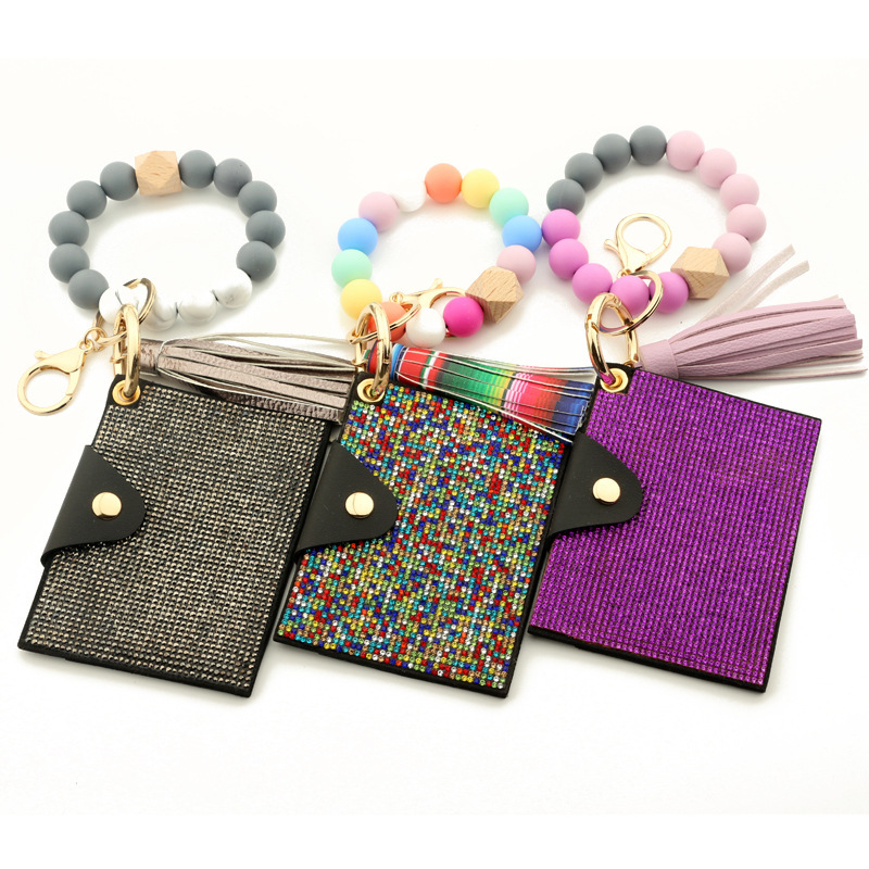 Wholesale bling wallet, silicone wristband keychain.