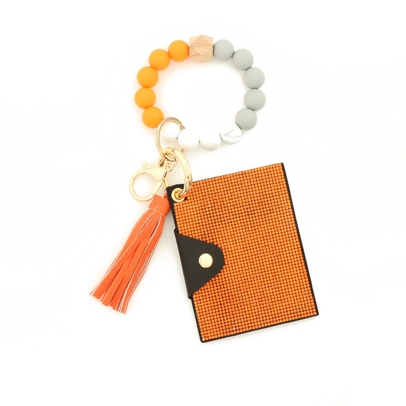 Wholesale bling wallet, silicone wristband keychain.