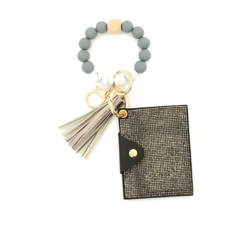 Wholesale bling wallet, silicone wristband keychain.