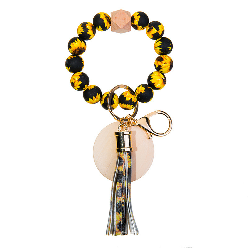 Wholesale colorful silicone printed beads keychains.