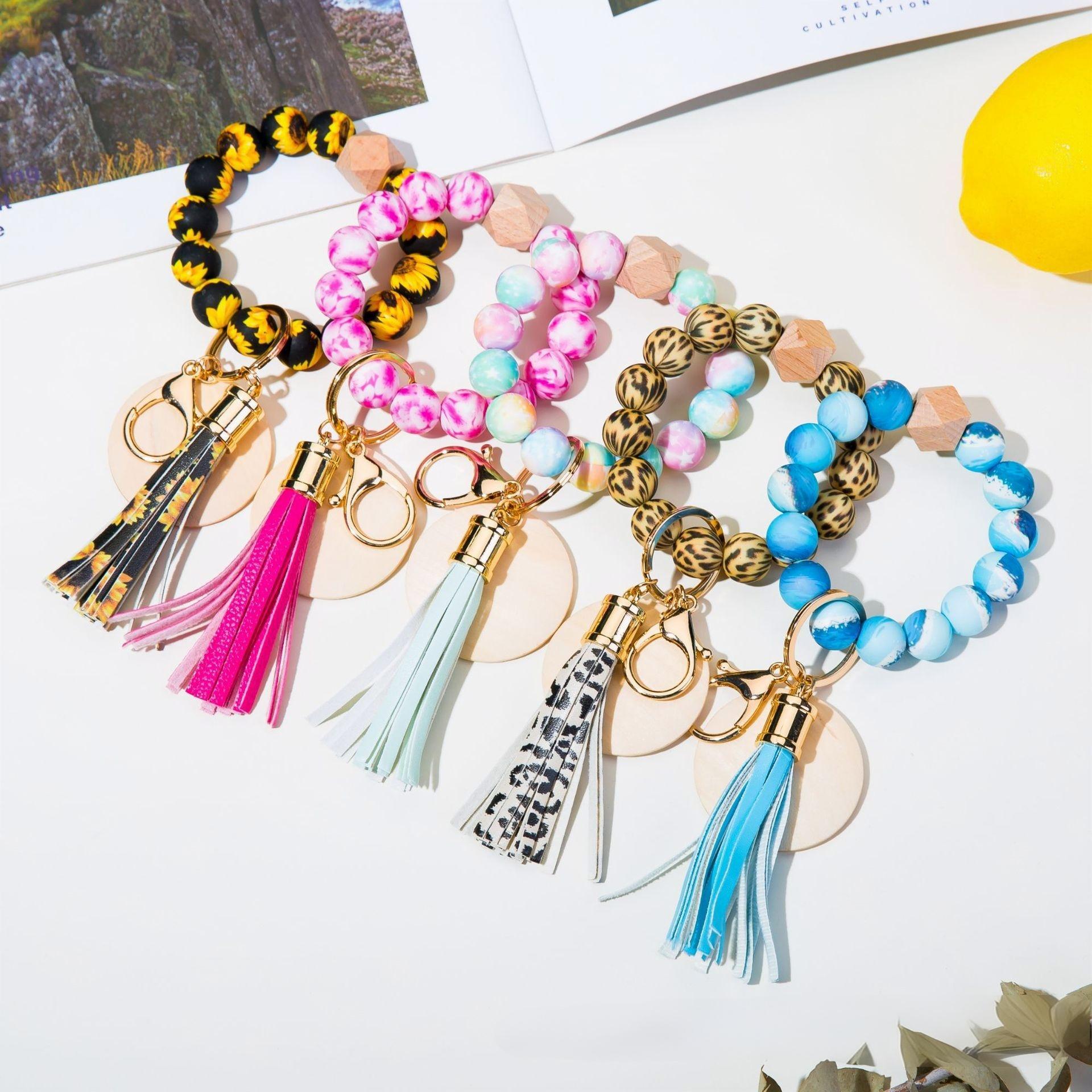 Wholesale colorful silicone printed beads keychains.