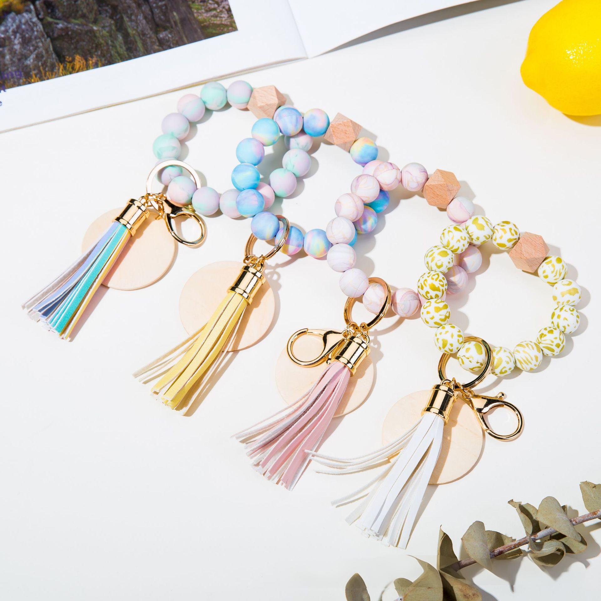Wholesale colorful silicone printed beads keychains.