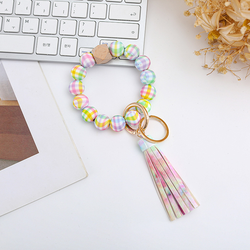 Wholesale colorful silicone printed beads keychains.