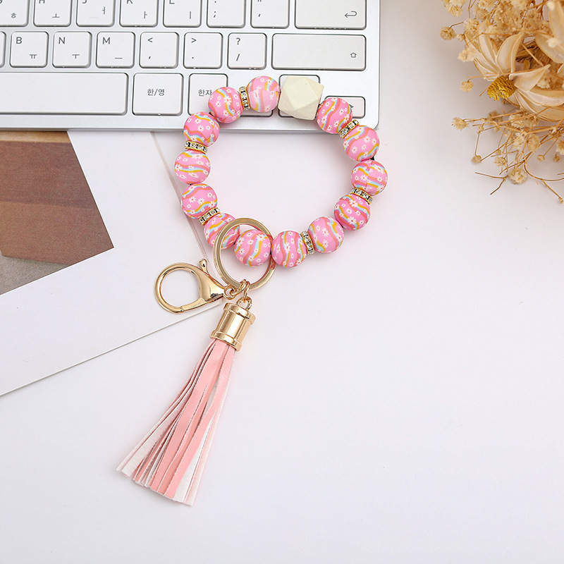 Wholesale colorful silicone printed beads keychains.