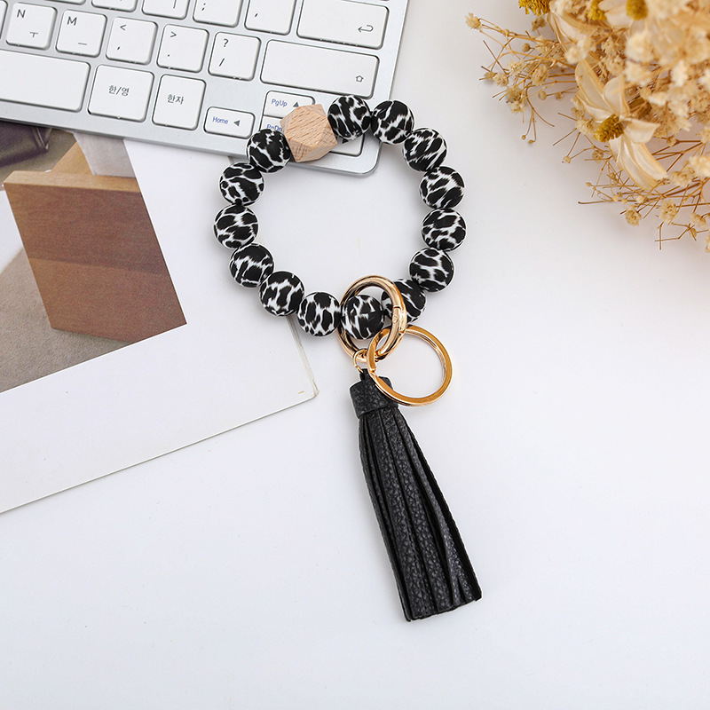Wholesale colorful silicone printed beads keychains.