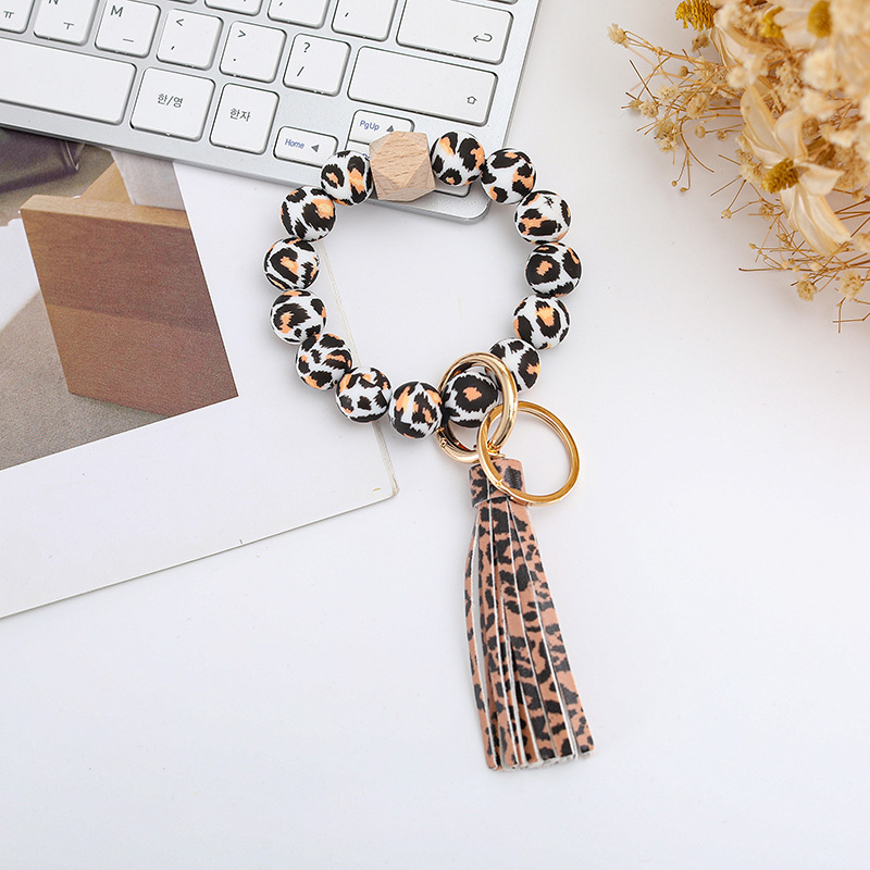 Wholesale colorful silicone printed beads keychains.