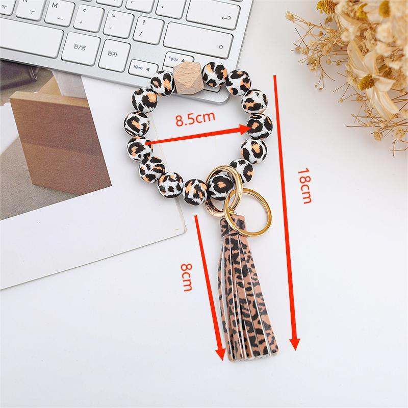 Wholesale colorful silicone printed beads keychains.