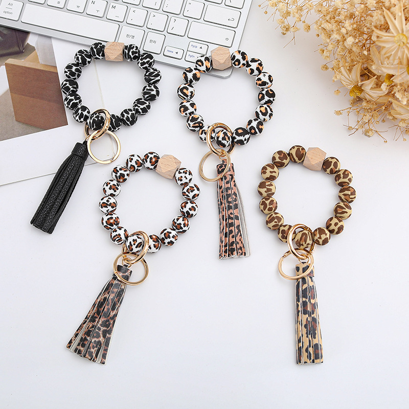 Wholesale colorful silicone printed beads keychains.