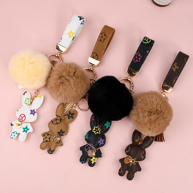 Wholesale Rex rabbit fur ball keychains, cute, plush, mascot car keychains.