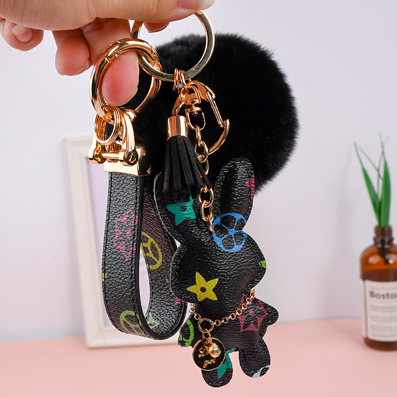 Wholesale Rex rabbit fur ball keychains, cute, plush, mascot car keychains.