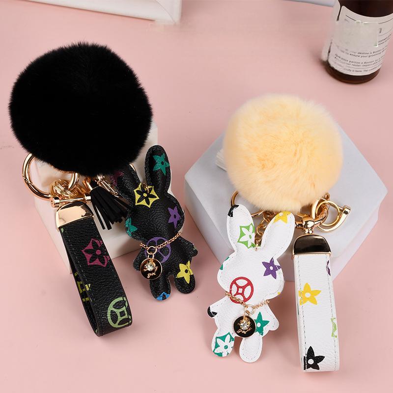 Wholesale Rex rabbit fur ball keychains, cute, plush, mascot car keychains.