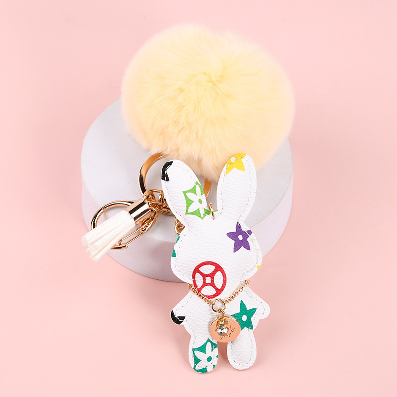 Wholesale Rex rabbit fur ball keychains, cute, plush, mascot car keychains, women's bag pendants.